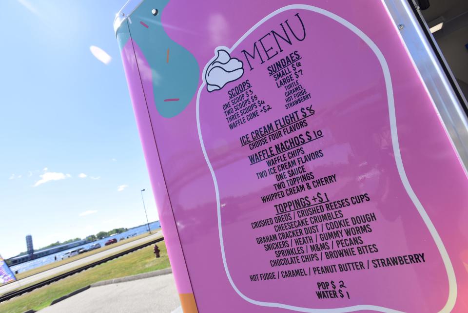 The menu at the new ice cream truck Here's The Scoop parked on the waterfront along Thomas Edison Parkway on Friday, July 29, 2022.