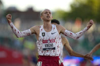 FILE - Woody Kincaid celebrates after winning the men's 10000-meter run at the U.S. Olympic Track and Field Trials in Eugene, Ore., in this Friday, June 18, 2021, file photo. Nike became a leader because it spearheaded innovation that helped people run faster. (AP Photo/Ashley Landis, File)