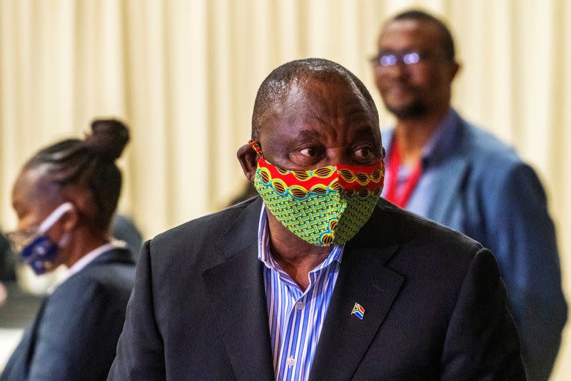 FILE PHOTO: South African President Cyril Ramaphosa visits the coronavirus disease (COVID-19) treatment facilities in Johannesburg