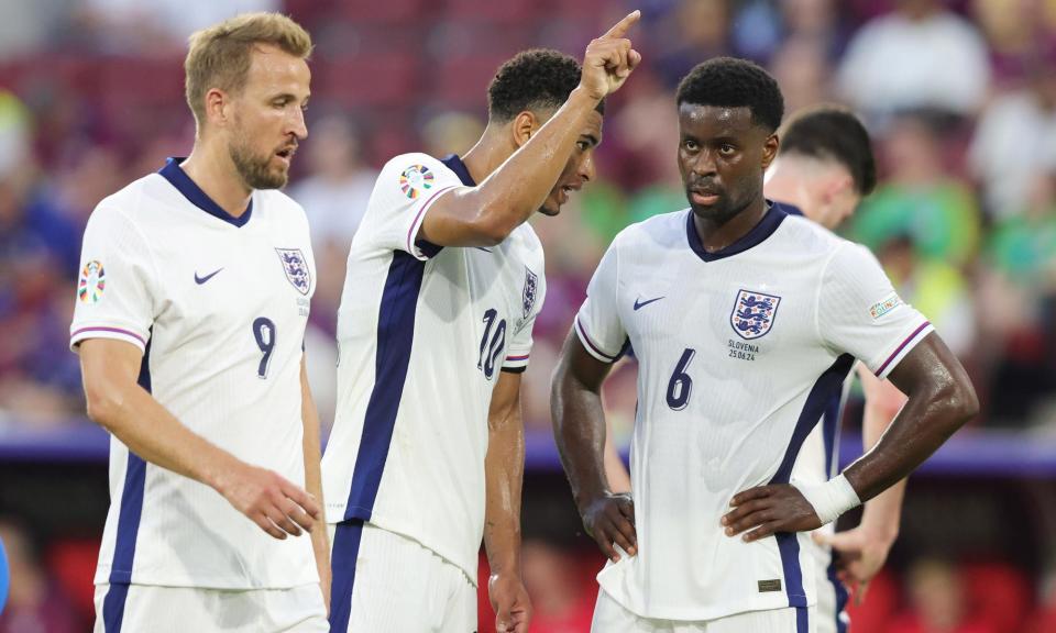 <span>Jude Bellingham, Harry Kane and Marc Guéhi during <a class="link " href="https://sports.yahoo.com/soccer/teams/england/" data-i13n="sec:content-canvas;subsec:anchor_text;elm:context_link" data-ylk="slk:England;sec:content-canvas;subsec:anchor_text;elm:context_link;itc:0">England</a>’s disjointed display against Slovenia.</span><span>Photograph: Sebastian El-Saqqa/firo sportphoto/Getty Images</span>