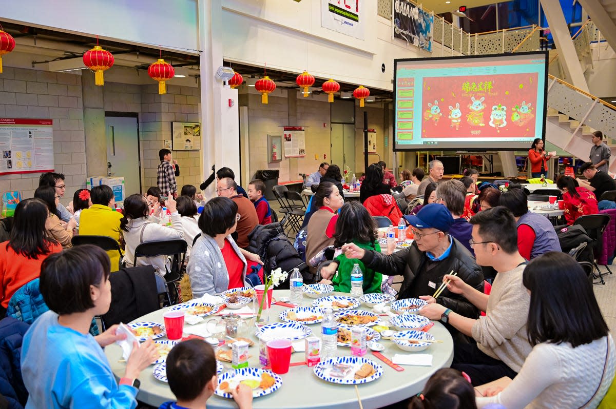 People gather together to enjoy food, company and activities as part of the Chinese Faculty and Scholar Association's celebration of Lunar New Year at Iowa State University on the evening of Jan. 21, 2023. (That was Jan. 22 in China, this year's date of Lunar New Year, which is based on the phases of the moon.) It was the association's first such celebration, though maybe not the first on campus to recognize the important holiday that's celebrated in many countries in Asia.