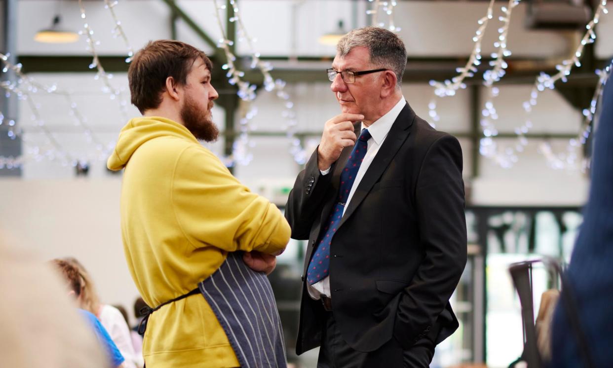 <span>Chris McEwan (right), Labour’s candidate for the Tees Valley mayoral election on 2 May, speaks to Ory Vanes, a deli owner in Darlington.</span><span>Photograph: Christopher Thomond/The Guardian</span>