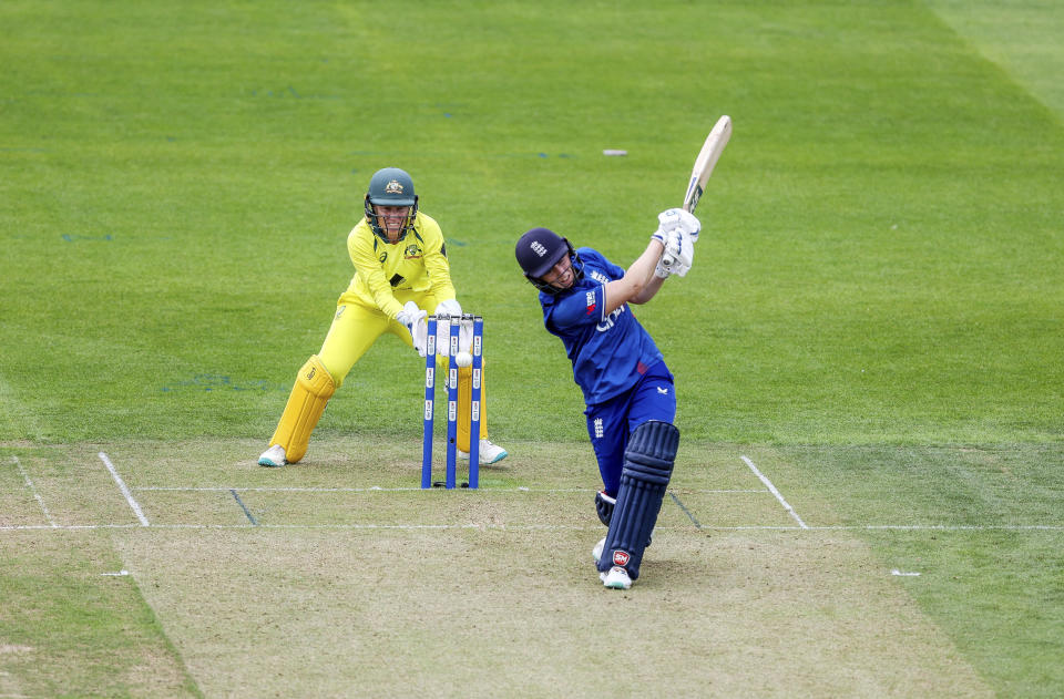 England's Tammy Beaumont is bowled out by Australia's Alana King during the third one day international of the Women's Ashes Series at the at Cooper Associates County Ground, Taunton, England, Tuesday July 18, 2023. (Steven Paston/PA via AP)