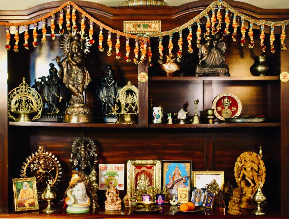 A sacred swastika is the centerpiece of a shrine in the home of Gokul Kunnath, president of the United States Hindu Alliance. The symbol, which was misappropriated by Nazi Germany as the Hakenkreuz, is held sacred in Dharmic faiths.