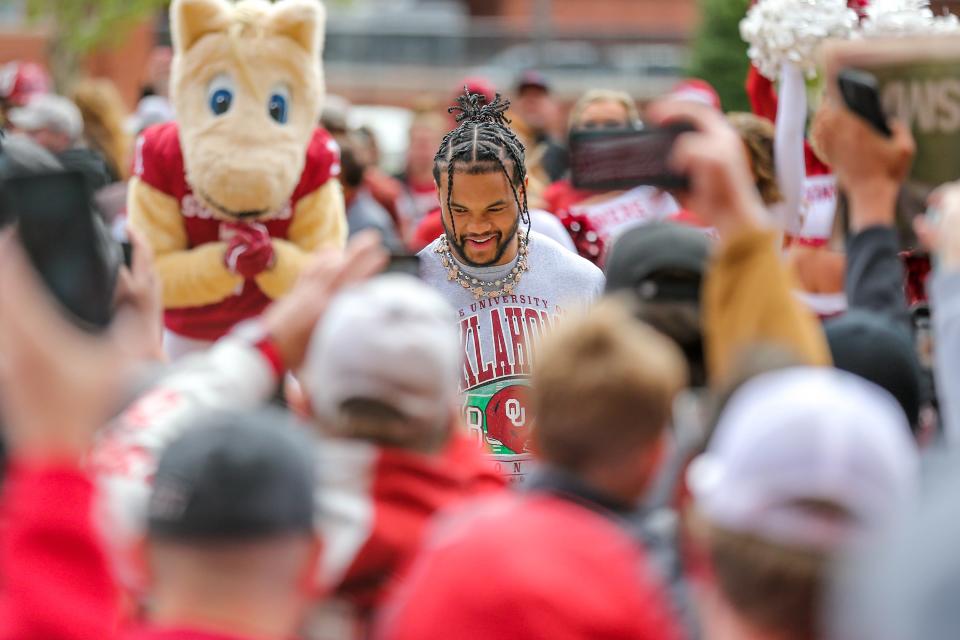 Kyler Murray attends a ceremony for the unveiling of his statue before a spring scrimmage game at Gaylord Family Oklahoma Memorial Stadium in Norman Okla., on Saturday, April 22, 2023.