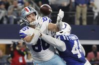 Indianapolis Colts' Zaire Franklin (44) breaks up a pass intended for Dallas Cowboys' Dalton Schultz (86) during the first half of an NFL football game, Sunday, Dec. 4, 2022, in Arlington, Texas. (AP Photo/Michael Ainsworth)