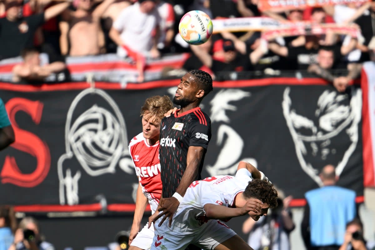 Union Berlin went top of the Bundesliga for the first time in their history with a win at Cologne (Federico Gambarini/dpa) (AP)