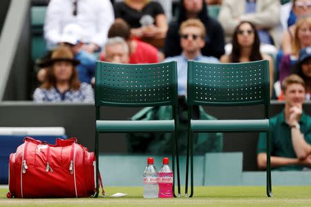 The gear of Spain's Feliciano Lopez is seen on Court 1 during his match against Australia's Nick Kyrgios at the Wimbledon Tennis Championships in London, Britain July 3, 2016. REUTERS/Stefan Wermuth