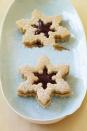 <p>These adorable, festive Christmas cookies are simple, but delicious, plus they are filled with the most classic, kid-friendly flavor combination of all.</p><p><em><a href="https://www.womansday.com/food-recipes/food-drinks/recipes/a32726/pbj-snowflakes-recipe-rbk1210/" rel="nofollow noopener" target="_blank" data-ylk="slk:Get the recipe;elm:context_link;itc:0;sec:content-canvas" class="link ">Get the recipe</a>.</em></p>