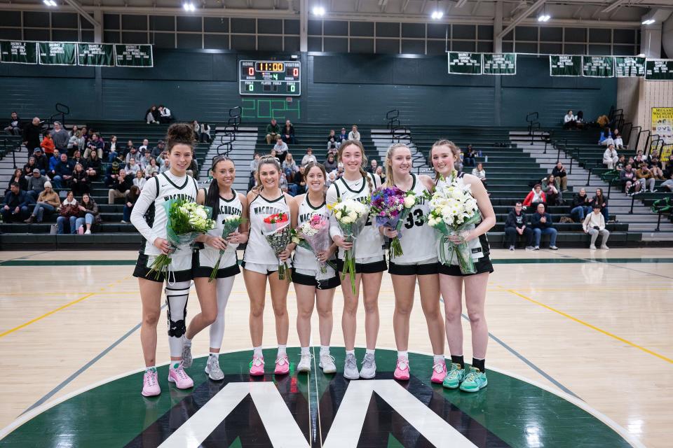 Wachusett Regional girls' basketball seniors, from left, Rileigh Leary, Mary Gibbons, Lilly Chaisson, Caitlin Ciccone, Hannah Best, Olivia Reidy and Liz Cain are honored on Senior Night.