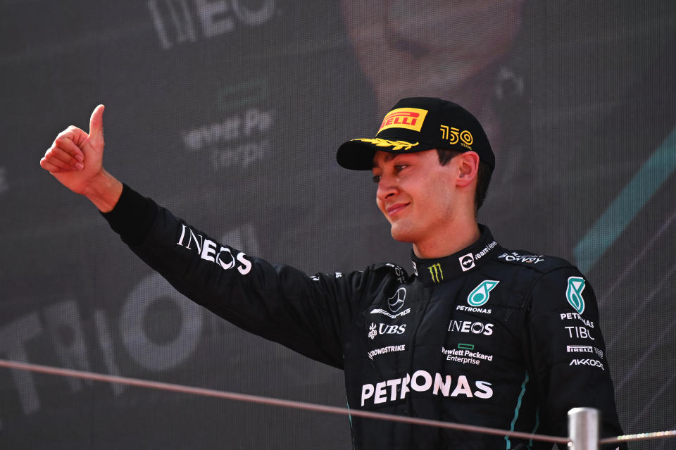 BARCELONA, SPAIN - MAY 22: Third placed George Russell of Great Britain and Mercedes celebrates on the podium during the F1 Grand Prix of Spain at Circuit de Barcelona-Catalunya on May 22, 2022 in Barcelona, Spain. (Photo by Clive Mason/Getty Images)