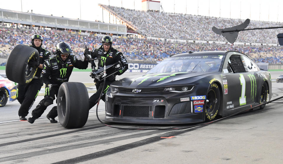 Kurt Busch makes a pit stop during the NASCAR Cup Series auto race at Kentucky Speedway in Sparta, Ky., Saturday, July 13, 2019. (AP Photo/Timothy D. Easley)