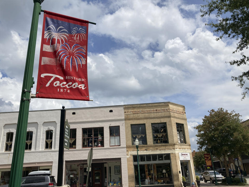 A sign for downtown Toccoa, Ga., is displayed on Friday, Sept. 2, 2022. Republicans in Georgia increasingly rely on voters in north Georgia areas including Toccoa as their margins shrink in suburban Atlanta. (AP Photo/Jeff Amy)
