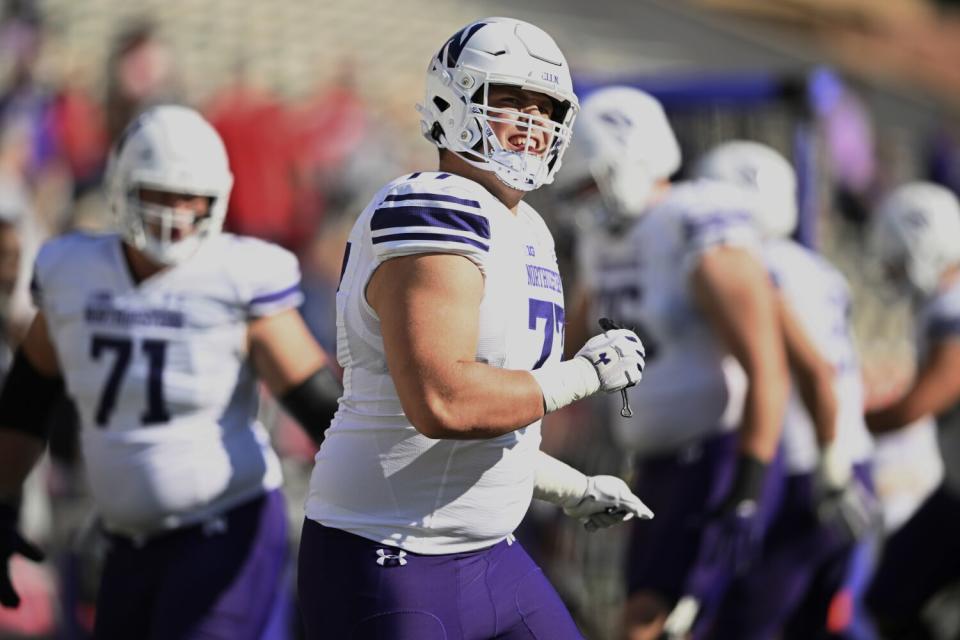 Northwestern offensive lineman Peter Skoronski warms up before a game against Penn State in October.