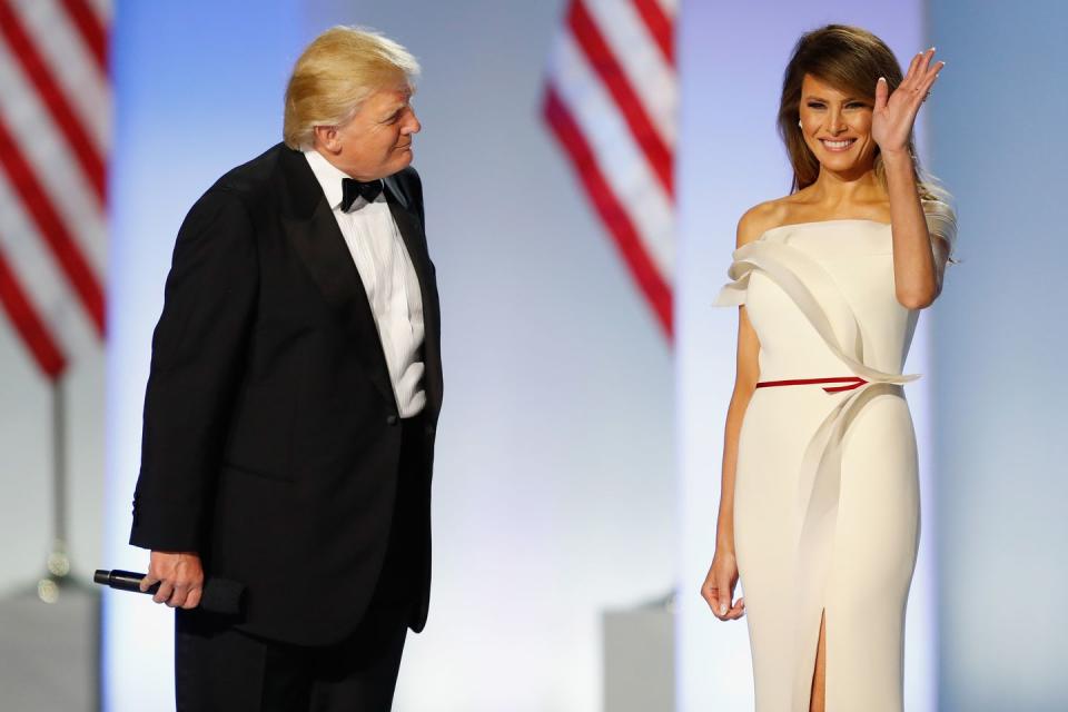 <p>Melania looks statuesque in this form fitting white gown by one of her favorite designers, Hervé Pierre, while attending the Inauguration Freedom Ball in January 2017.</p>