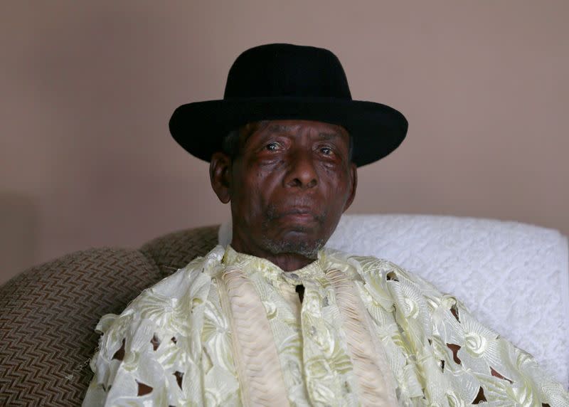 Elder Patrick Bakpoher, community leader of Ughievwen kingdom, looks on during an interview with Reuters in Ughelli, Delta State