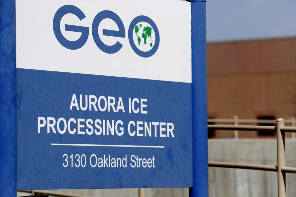 FILE - This April 15, 2017, file photo, shows the entrance to the GEO Group's immigrant detention facility in Aurora, Colo. The Homeland Security Department's internal watchdog says rotting food, moldy and dilapidated bathrooms and agency practices at immigration detention facilities may violate detainees' rights. At the facility in Aurora detainees were not allowed visits from friends or families, even though there was room for them to do so. Managers said they were concerned about drugs or weapons being smuggled, but acknowledged that visits should be considered. (AP Photo/David Zalubowski, File)