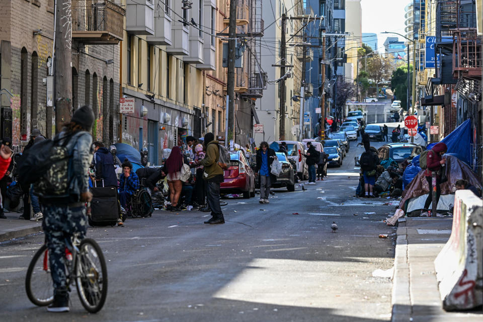 Homeless people line a street in San Francisco on Feb. 26, 2024. (Tayfun Coskun / Anadolu via Getty Images file)