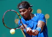 Rafael Nadal of Spain returns the ball to Andreas Seppi of Italy during the Monte Carlo Masters in Monaco April 17, 2014. REUTERS/Eric Gaillard