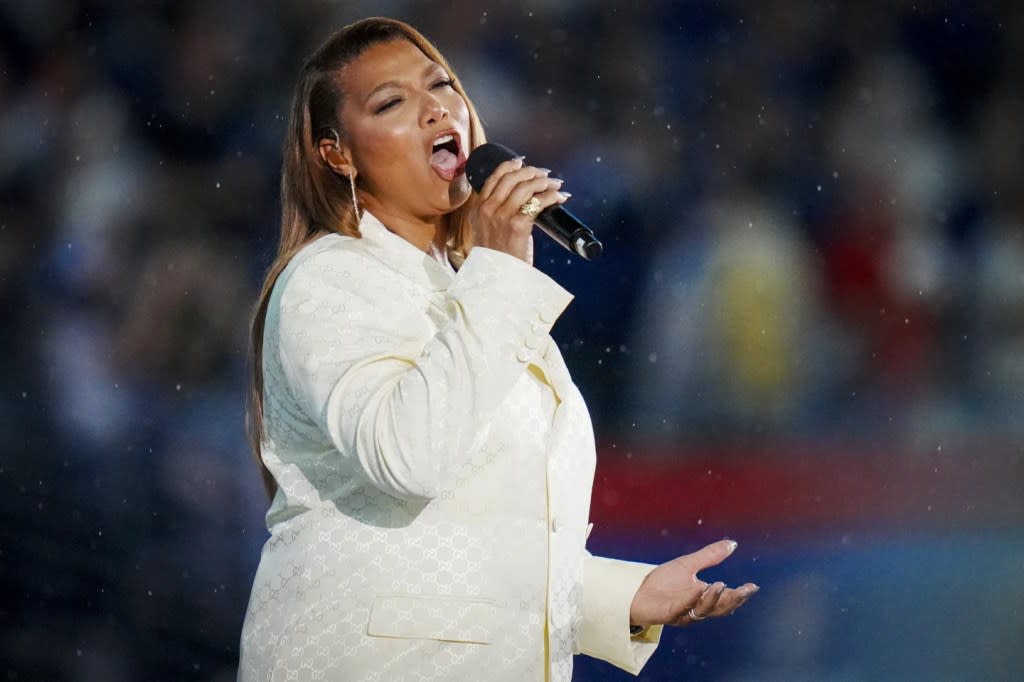 Queen Latifah sings the national anthem before an NFL football game between the Dallas Cowboys and New York Giants on Sunday, Sept. 10, 2023, in East Rutherford, N.J. (AP Photo/Rusty Jones, File)