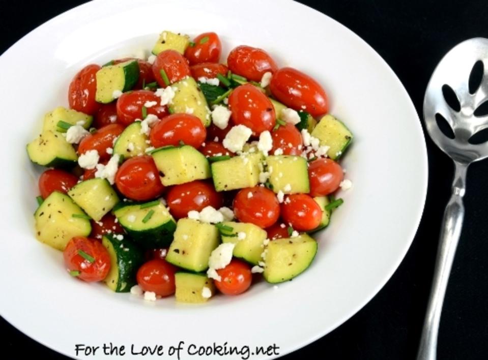 <p>Climb into this bowl of summer produce perfection. </p><p><strong>Get the recipe: <a href="http://www.fortheloveofcooking.net/2013/04/roasted-grape-tomatoes-and-zucchini-topped-with-feta-and-chives.html" rel="nofollow noopener" target="_blank" data-ylk="slk:Roasted Grape Tomatoes and Zucchini Topped with Feta and Chives;elm:context_link;itc:0;sec:content-canvas" class="link ">Roasted Grape Tomatoes and Zucchini Topped with Feta and Chives</a></strong></p><p><strong>Related: </strong><strong><a href="https://parade.com/1367744/theresagreco/orzo-recipes/#gid=ci02a514c23008247d&pid=lemony-chicken-and-asparagus-orzo" rel="nofollow noopener" target="_blank" data-ylk="slk:45 Outrageously Good Orzo Recipes;elm:context_link;itc:0;sec:content-canvas" class="link ">45 Outrageously Good Orzo Recipes</a></strong></p>