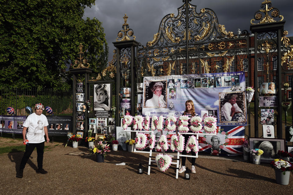 Flowers are placed at the gates outside Kensington Palace, London, the former home of Diana, Princess of Wales, on the 25th anniversary of her death. Picture date: Wednesday August 31, 2022.