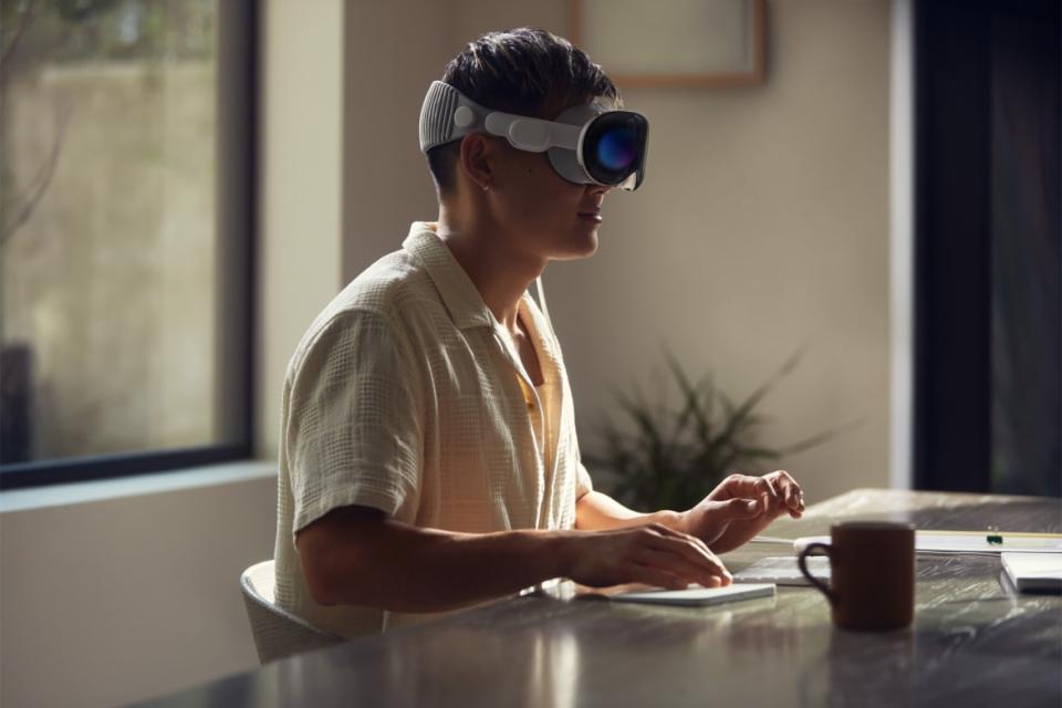 <div class="inline-image__caption"><p>The Vision Pro promises to do away with those pesky and cumbersome computer screens with a headset. </p></div> <div class="inline-image__credit">Apple</div>