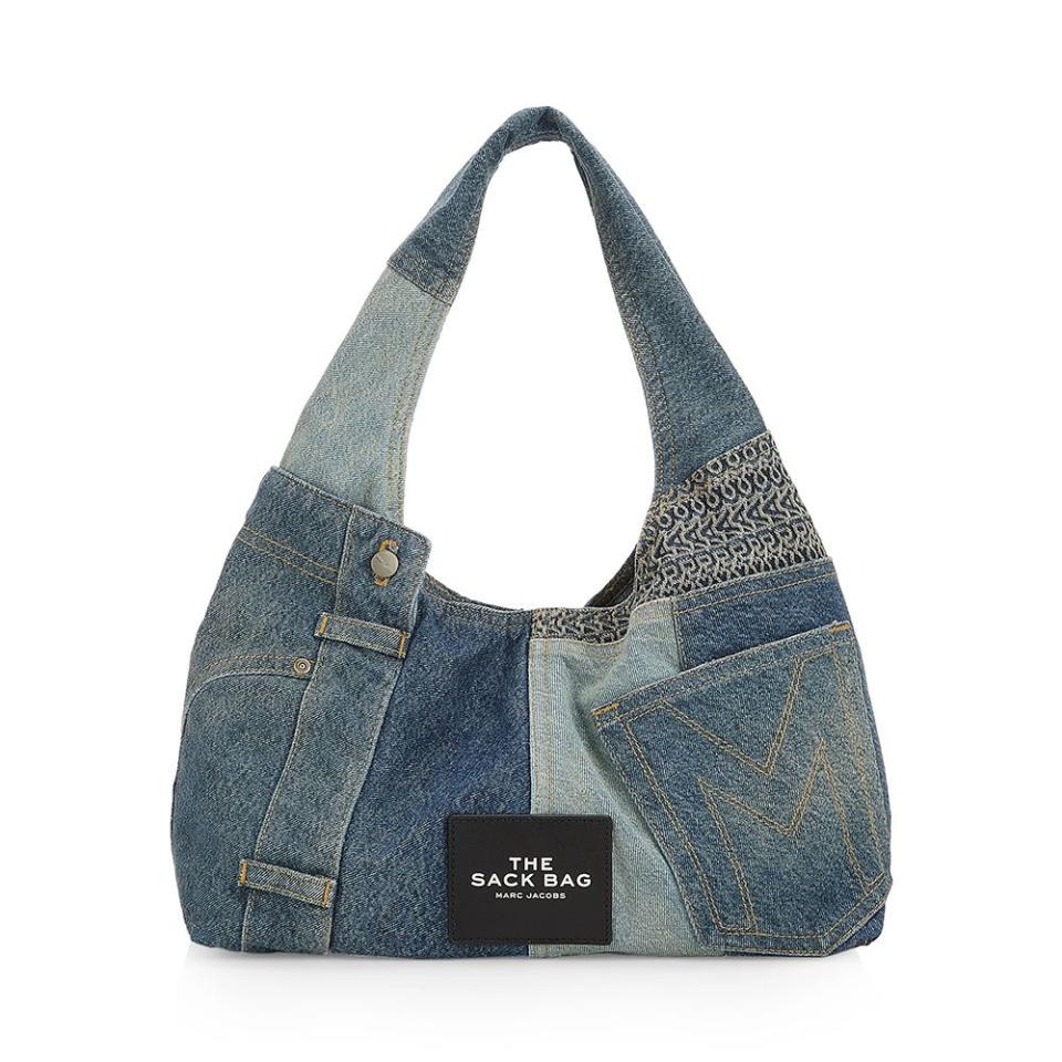 <p><a href="https://go.redirectingat.com?id=74968X1596630&url=https%3A%2F%2Fwww.saksfifthavenue.com%2Fproduct%2FMarc-Jacobs-The-Deconstructed-Denim-Sack-Bag-0400020590487.html%3Fdwvar_0400020590487_size%3DNo%2BSize%26dwvar_0400020590487_color%3DINDIGO%26site_refer%3DCSE_GGLPLA%253AWomens_Handbags%253AMarc%2BJacobs%26country%3DUS%26currency%3DUSD%26CSE_CID%3DG_Saks_PLA_US_Handbags_Must%2BWin%253AMarc%2BJacobs%26gad_source%3D1%26gclid%3DCjwKCAiAloavBhBOEiwAbtAJO56O3iI_CsbhhlC6VPWtFomu2cC00wrZ9tx3vh3MmQxA6B2RBmRpjxoCIXMQAvD_BwE%26gclsrc%3Daw.ds&sref=https%3A%2F%2Fwww.elle.com%2Ffashion%2Fshopping%2Fg60235368%2Fbest-denim-tote-bags%2F" rel="nofollow noopener" target="_blank" data-ylk="slk:Shop Now;elm:context_link;itc:0;sec:content-canvas" class="link ">Shop Now</a></p><p>The Deconstructed Denim Sack Bag</p><p>Saks Fifth Ave </p><p>$695.00</p>