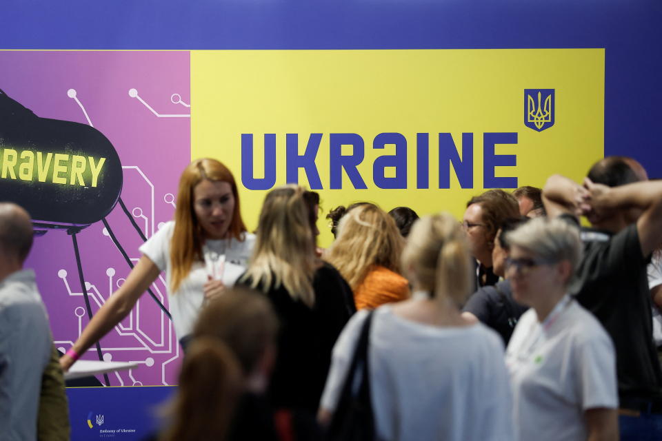 Attendees visit the Ukraine booth at the Viva Technology conference dedicated to innovation and startups, in Paris, France June 16, 2022. REUTERS/Benoit Tessier