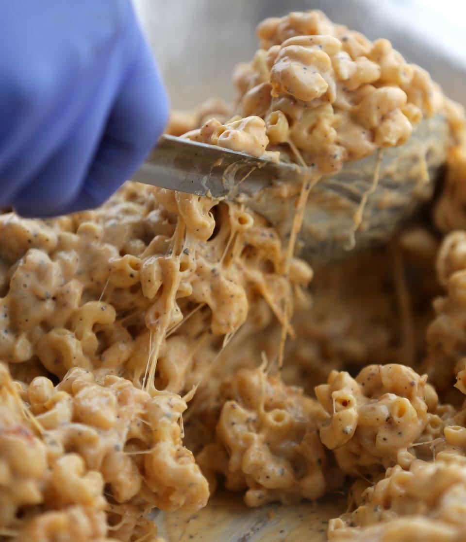 Owner Dustin Johnson stirs a batch of Smoked Mac in his food truck High Kaliber on Friday, April 26, 2024 in Appleton, Wis.
Wm. Glasheen USA TODAY NETWORK-Wisconsin

Seventh grade teacher Chia Lee at Wilson Middle School