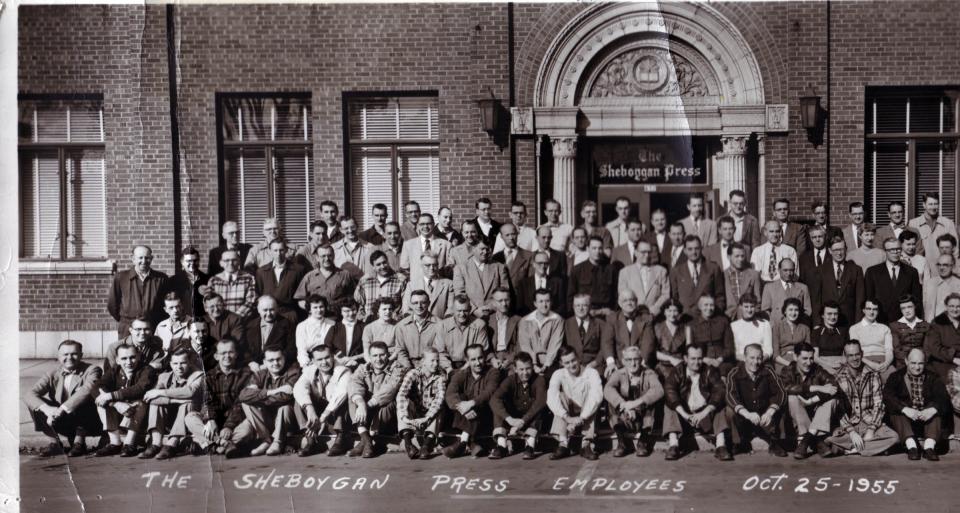 Sheboygan Press employees pose in front of the building in 1955.