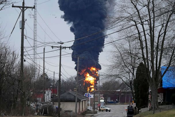 PHOTO: Flames and black smoke billow over East Palestine, Ohio, as a result of a controlled detonation of a portion of the derailed Norfolk Southern Railway train on Feb. 6, 2023. (Gene J. Puskar/AP)