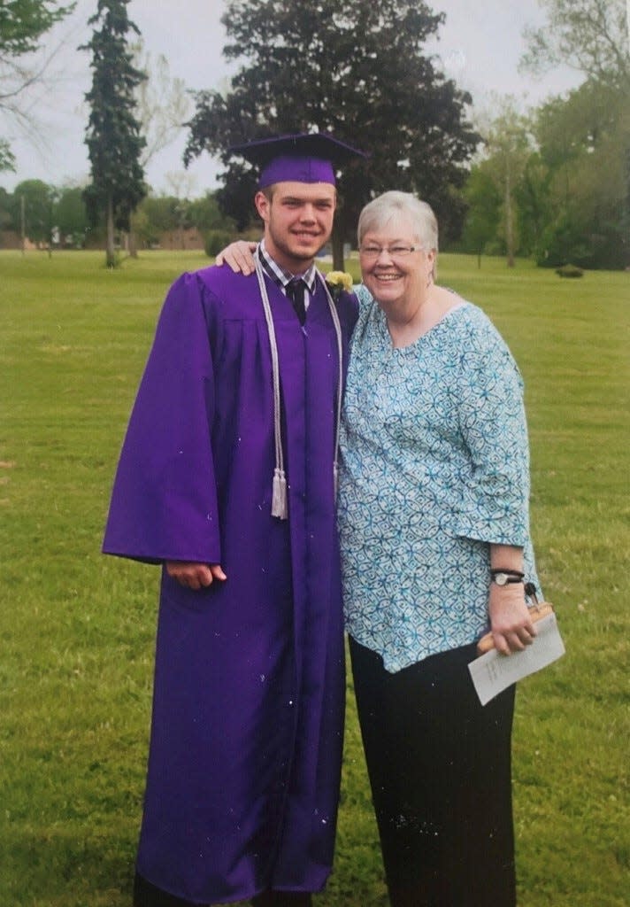 Michael Turner and his grandmother, Cindy Morton, at Turner's graduation from Champion High School in Champion, Ohio, in 2017.