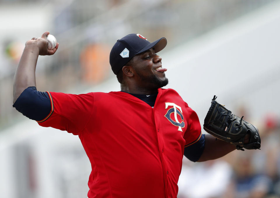 Minnesota Twins starting pitcher Michael Pineda (35) works in the first inning of a spring training baseball game against the Colorado Rockies Tuesday, March 26, 2019, in Fort Myers, Fla. (AP Photo/John Bazemore)