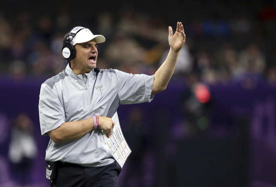 Troy head coach Neal Brown calls out from the sideline in the first half of the New Orleans Bowl NCAA college football game against North Texas in New Orleans, Saturday, Dec. 16, 2017. (AP Photo/Gerald Herbert)