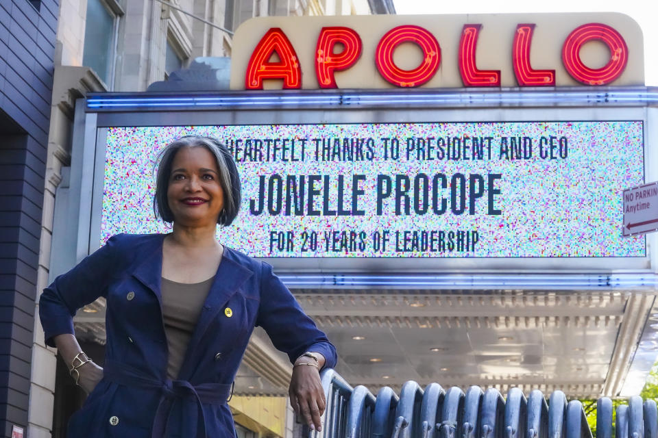 Apollo President and CEO Jonelle Procope, who will be ending her 20-year run leading the organization on June 12, poses under the Apollo Theatre marquee, Monday June 5, 2023, in New York. Procope has been critical in fundraising for the theater's renovations that have worked to restore it to its former glory. (AP Photo/Bebeto Matthews)