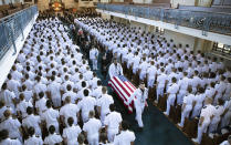 <p>In this image proved by the family of John McCain, the family follows as the casket of Sen. John McCain, R-Ariz., is moved from the Chapel on the grounds of the United States Naval Academy after a service Sunday, Sept. 2, 2018, in Annapolis, Md. (Photo: David Hume Kennerly/McCain Family via AP) </p>