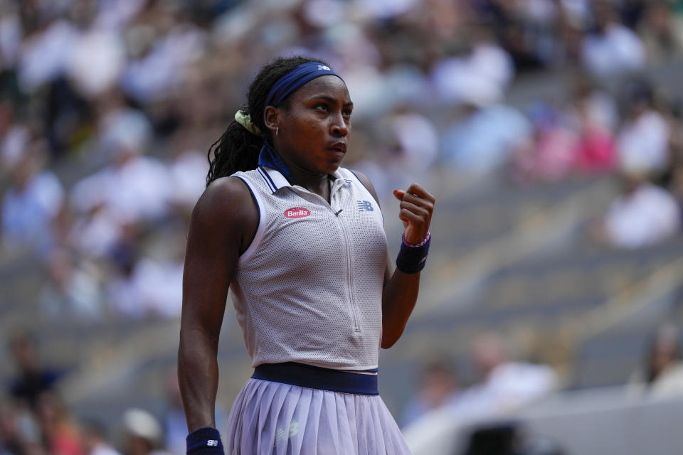 Coco Gauff of the U.S. clenches her fist after scoring a point against Tunisia's Ons Jabeur during their quarterfinal match of the French Open tennis tournament at the Roland Garros stadium in Paris, Tuesday, June 4, 2024. (AP Photo/Thibault Camus)