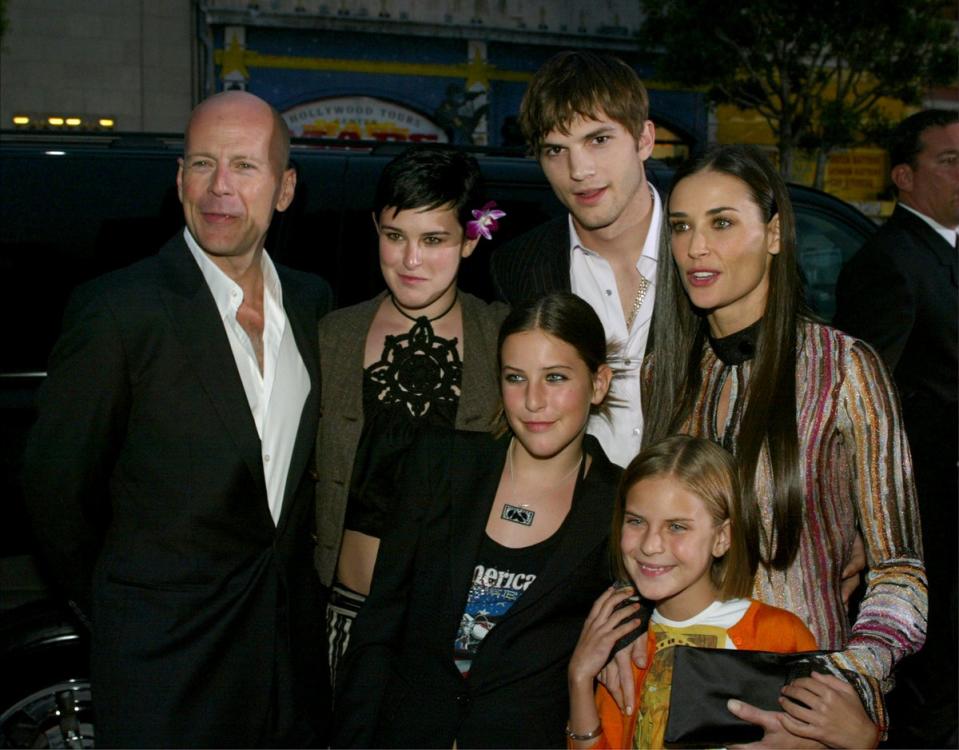 Ashton Kutcher with Demi Moore and Bruce Willis’ daughters: Rumer, Scout, and Tallulah Belle (Getty Images)