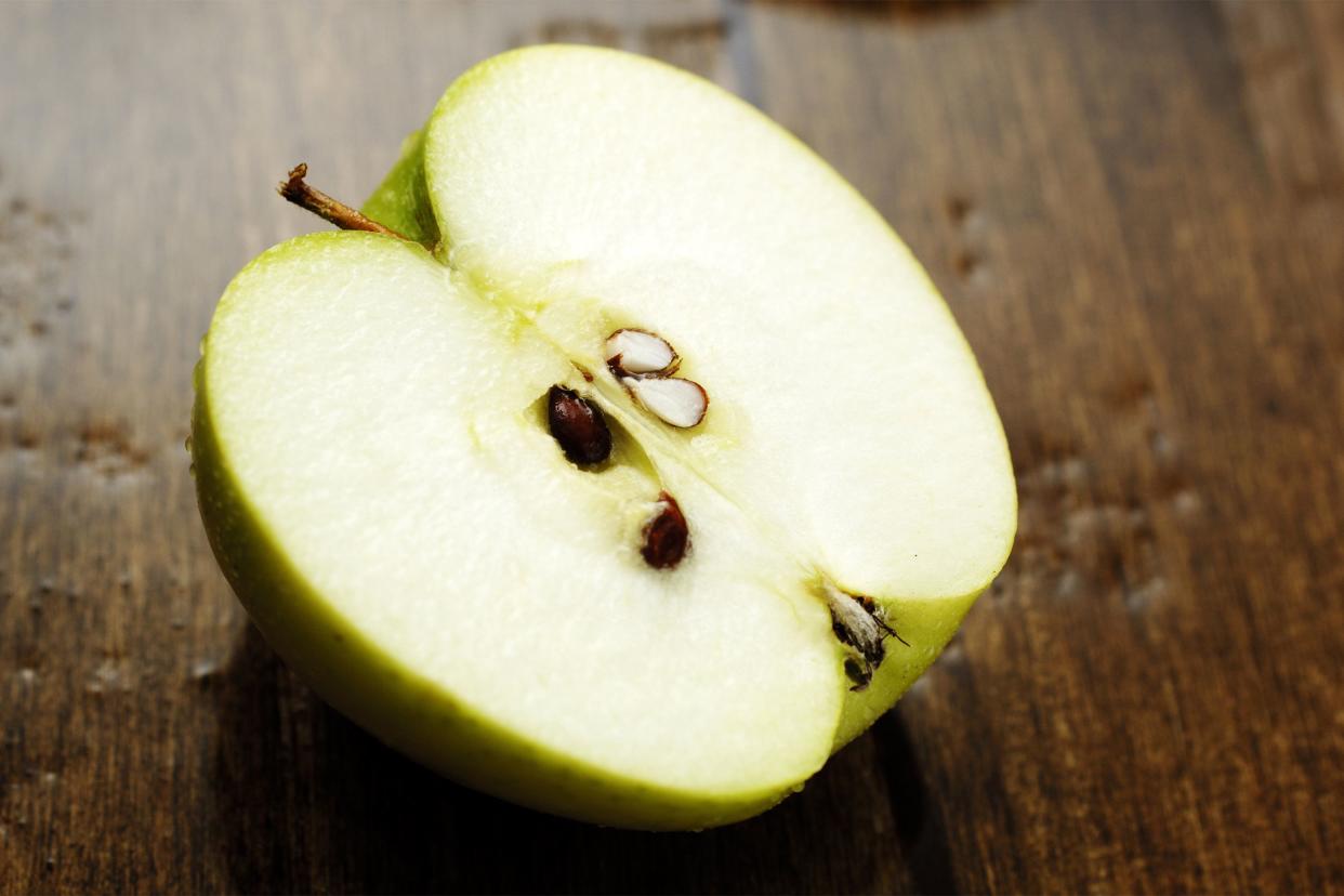 Cross section of an apple and its seeds