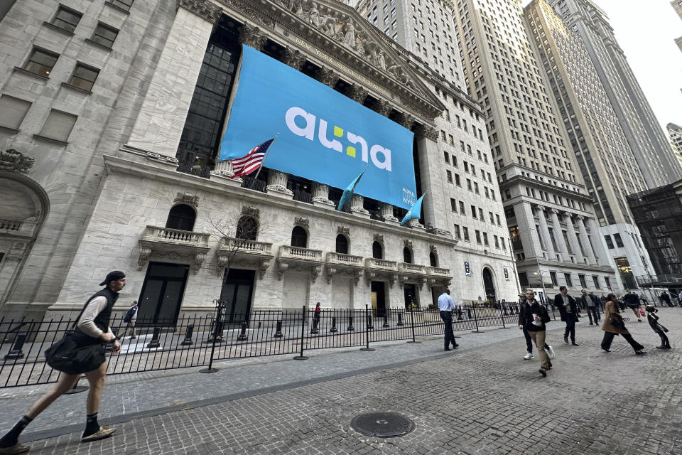 People walk past the New York Stock Exchange Wednesday, April 10, 2024 in New York. Wall Street marched higher ahead of the government's update on U.S. inflation which could play into the Federal Reserve's next interest rate decision. (AP Photo/Peter Morgan)