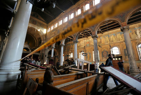 FILE PHOTO: Damage from the explosion inside Cairo's Coptic Orthodox Cathedral is seen inside the cathedral in Cairo, Egypt December 11, 2016. To match Analysis EGYPT-SECURITY/ REUTERS/Mohamed Abd El Ghany/File photo