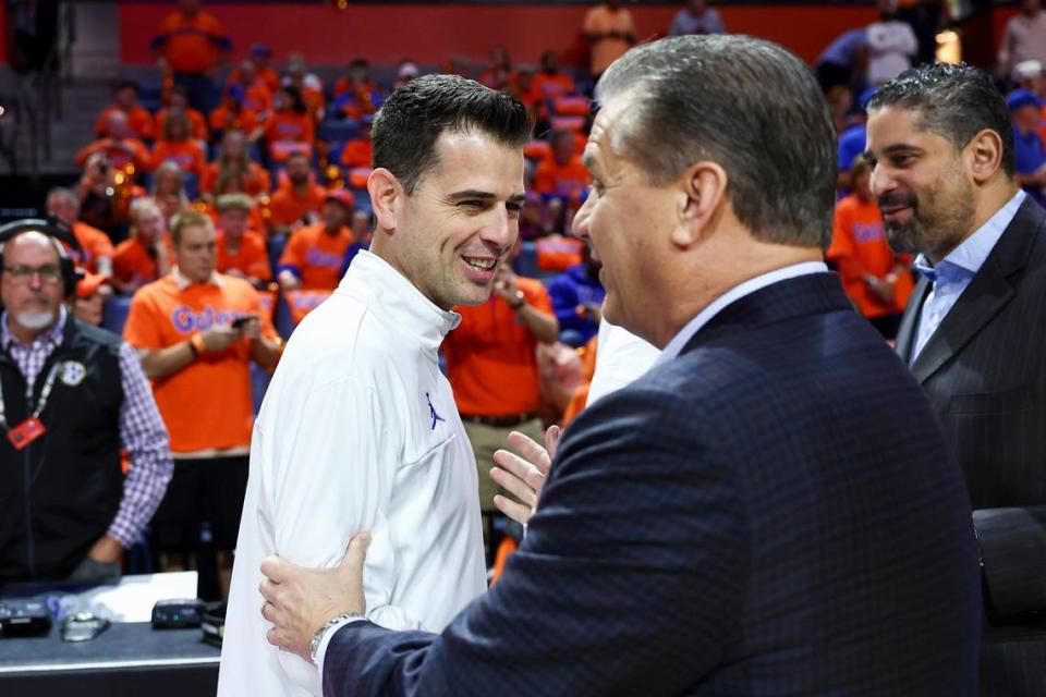 Kentucky Wildcats head coach John Calipari shakes hands with Florida Gators head coach Todd Golden before the game at the Stephen C. O’Connell Center in Gainesville, FL, Saturday, January 6, 2024.