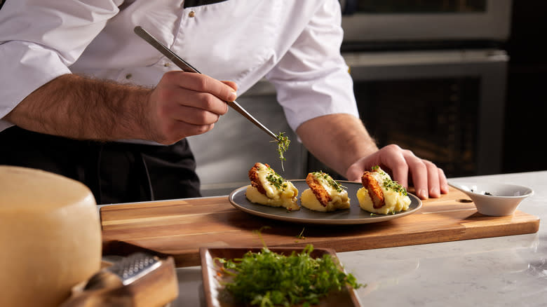 Chef plating food