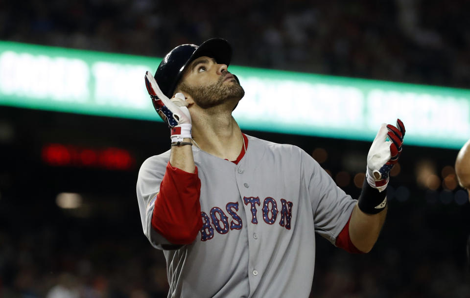 Boston Red Sox’ J.D. Martinez celebrates his two-run home run during the ninth inning of an interleague baseball game at Nationals Park Tuesday, July 3, 2018, in Washington. The Red Sox won 11-4. (AP Photo/Alex Brandon)