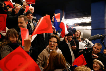 Former Polish Prime Minister Ewa Kopacz and other supporters of the European Council President Donald Tusk wait for his arrival at the central train station in Warsaw, Poland April 19, 2017. REUTERS/Kacper Pempel