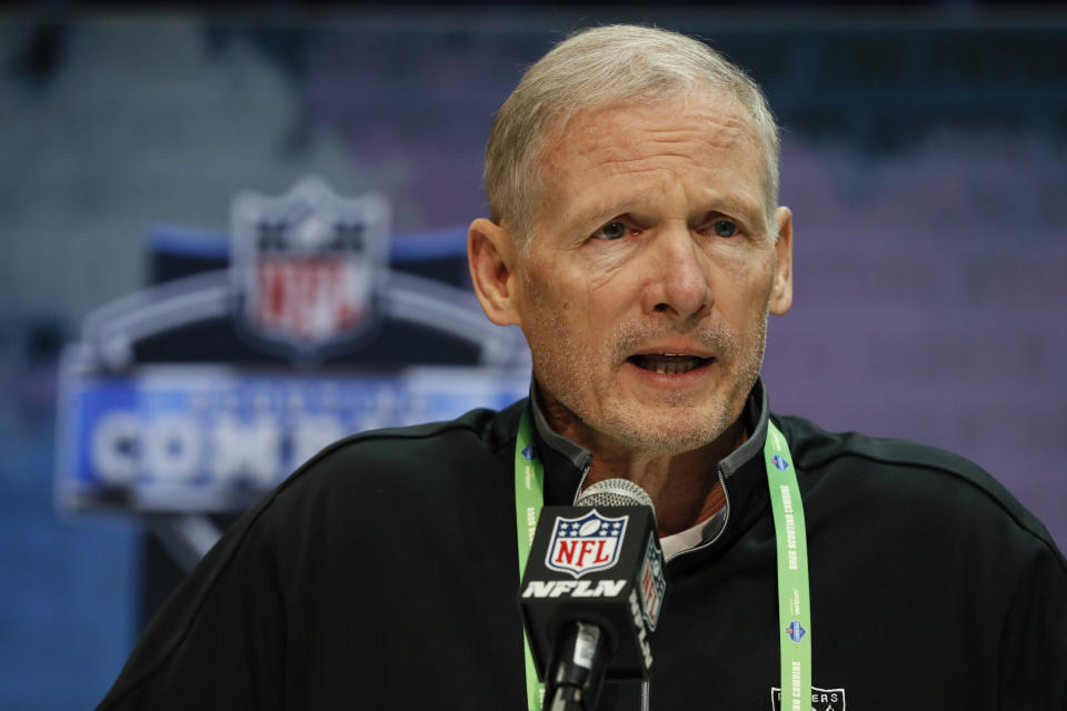 Mike Mayock says he's "happy" with Derek Carr but won't shut door on making an offseason quarterback change. (AP Photo/Charlie Neibergall)