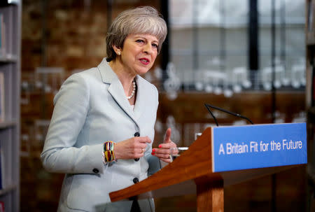 Britain's Prime Minister Theresa May delivers a speech to students and staff during her visit to Derby College in Derby, Britain, February 19, 2018. REUTERS/Christopher Furlong/Pool