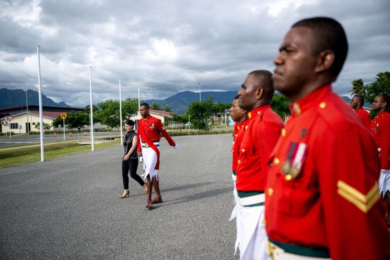 German Foreign Minister Annalena Baerbock attends an honorary salute at the Fijian Armed Forces Blackrock Peacekeeping and Humanitarian Assistance and Disaster Relief Camp. Sina Schuldt/dpa