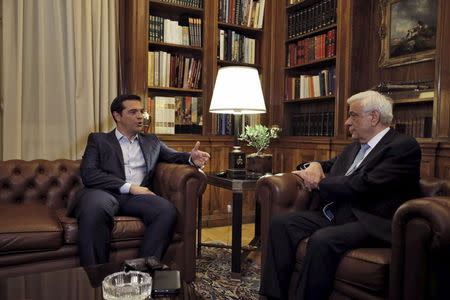 Greek Prime Minister Alexis Tspiras (L) meets with Greece's President Prokopis Pavlopoulios in Athens, Greece, August 20, 2015. REUTERS/Alkis Konstantinidis